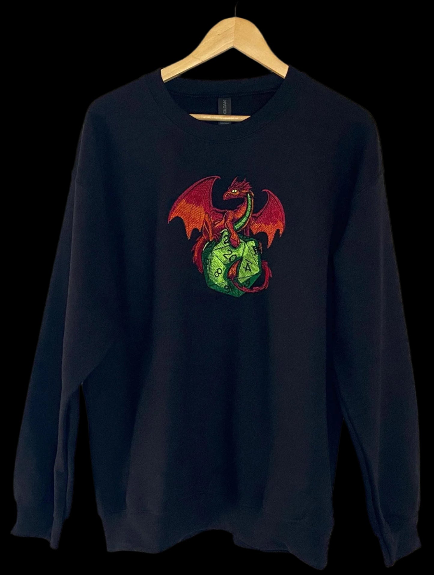 Black sweatshirt with a colorful dragon design on a white background