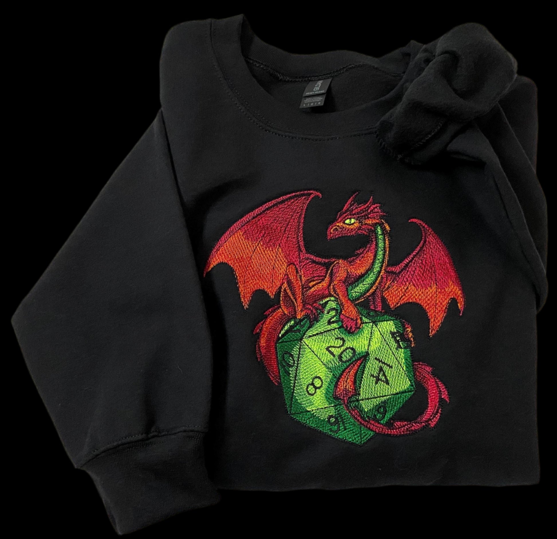 Black sweatshirt with a colorful dragon and green die design on a white background